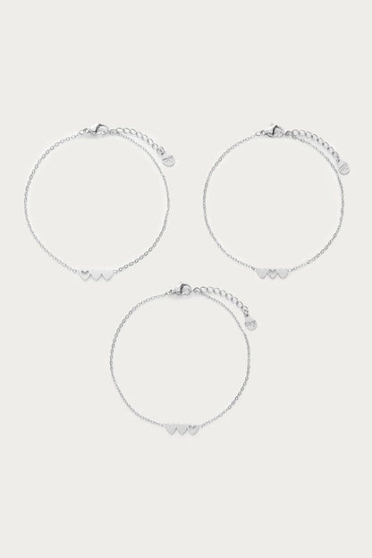 Conjunto de pulseras triple corazón